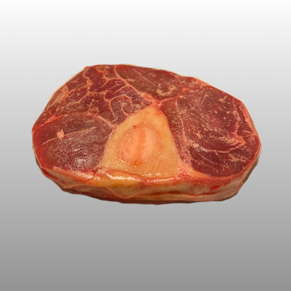 Biodynamische runderschenkel, stevig rundvlees met bot voor diepe smaak in slow-cooking gerechten.