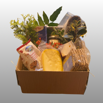 “Kerstpakket Gezellige Winteravond met kaas, lekkernijen en handgemaakte kaars – Boerderij Ruimzicht”